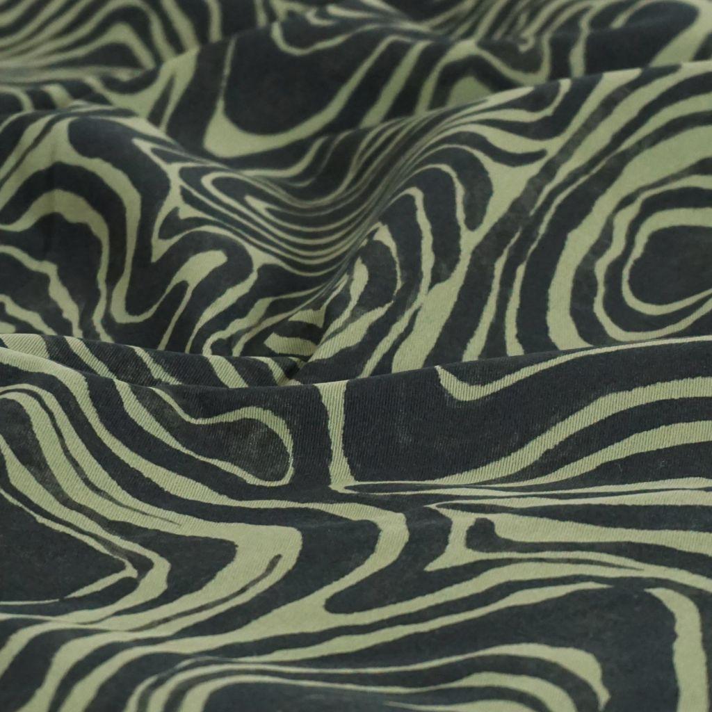 Baumwoll-Stretch animalprint Zebra olive schwarz